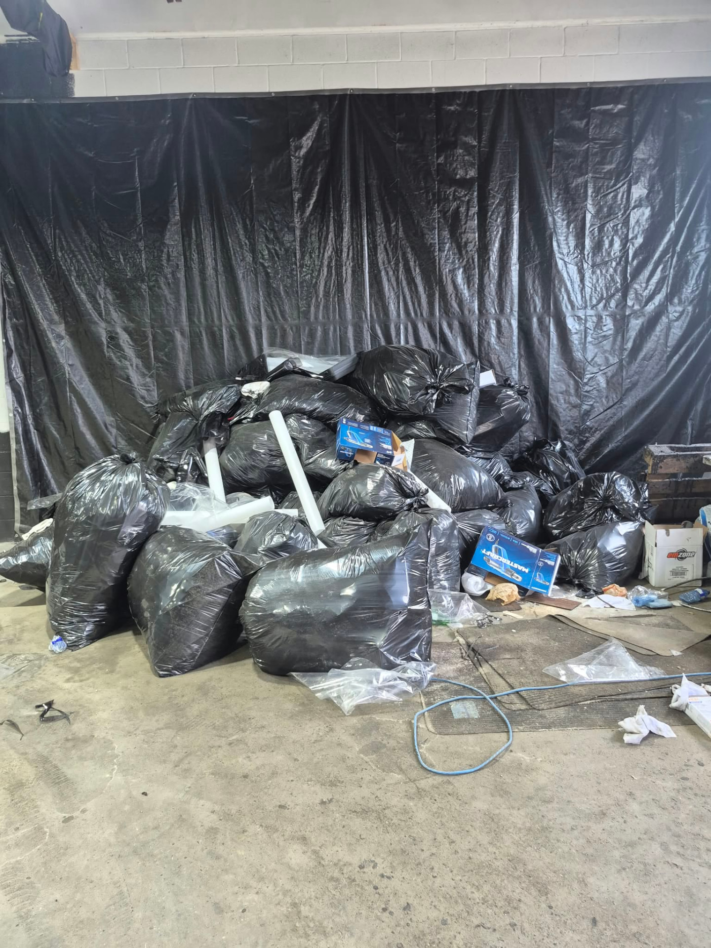 Before: commercial cleanout — space filled with junk